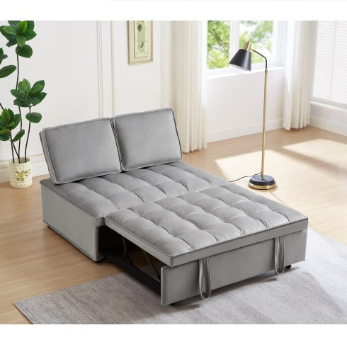 Grey double seat sofa bed with detachable backs in a bright living room setting