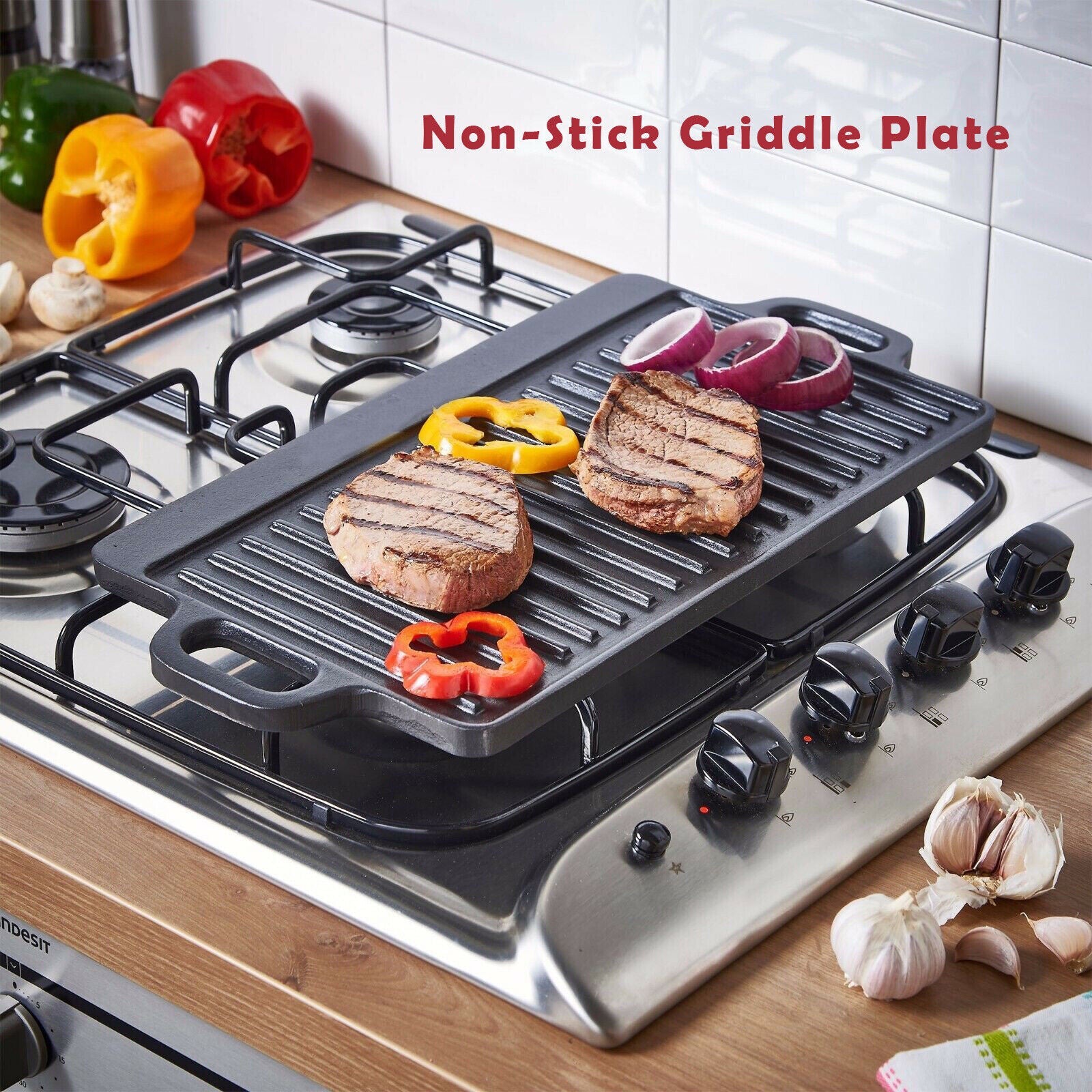 Shopi Vella double sided cast iron griddle pan grilling steaks and peppers on gas stove