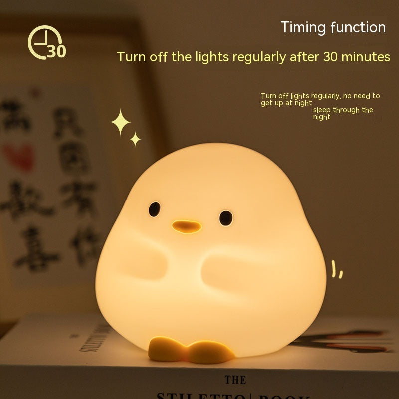 Cartoon LED sleeping light shaped like a cute glowing chick with timing function by Shopi Vella