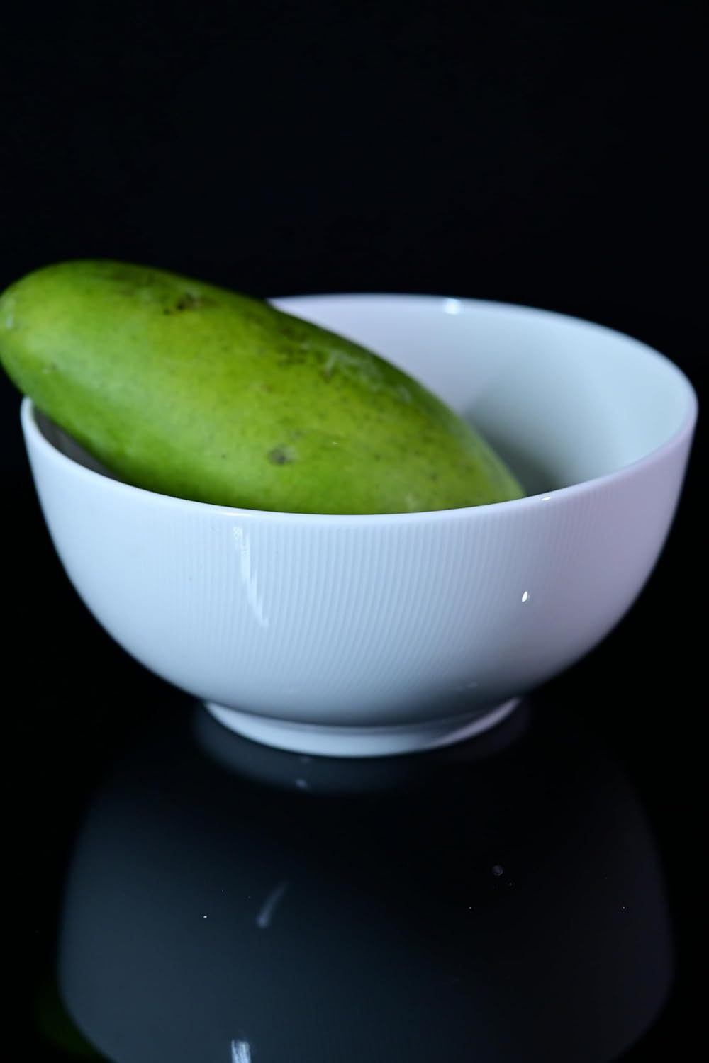 8 inch large soup bowl set white ceramic bowl with green mango inside on black background
