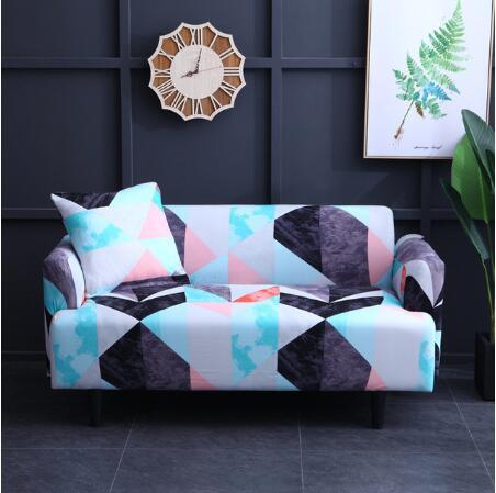 Colorful geometric pattern elastic sofa cover on a two-seater sofa in a modern living room