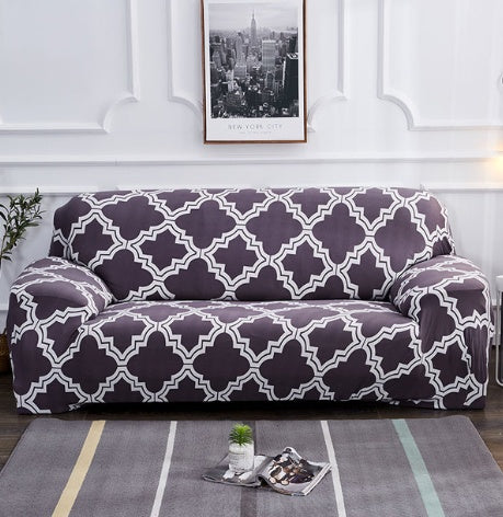Gray and white patterned elastic sofa cover on a three-seat sofa in a modern living room