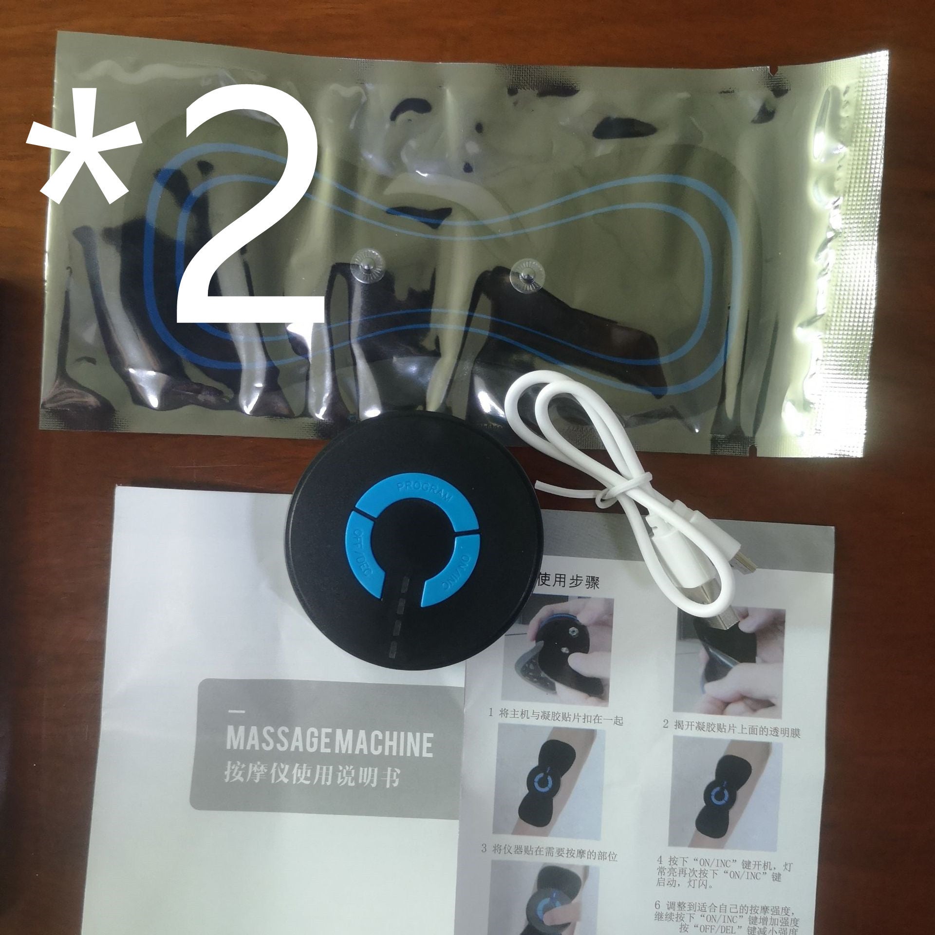 Shopi Vella electric neck and shoulder massager with gel pads, USB charging cable, and instruction manual