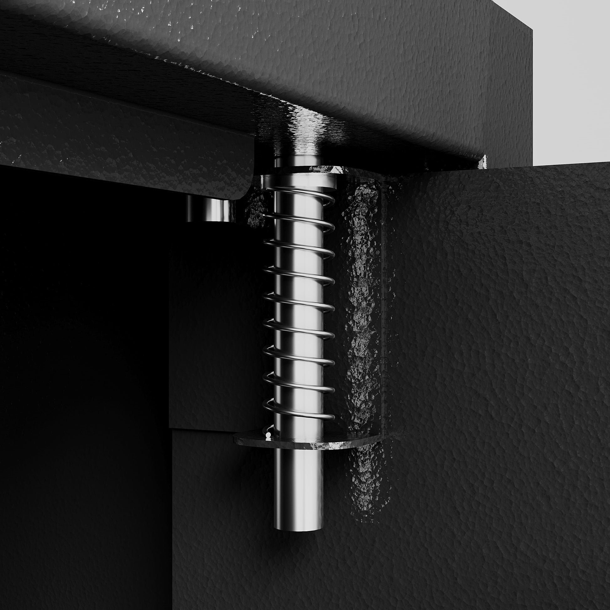 Close-up of a metal locking mechanism detail on a black electronic security safe box