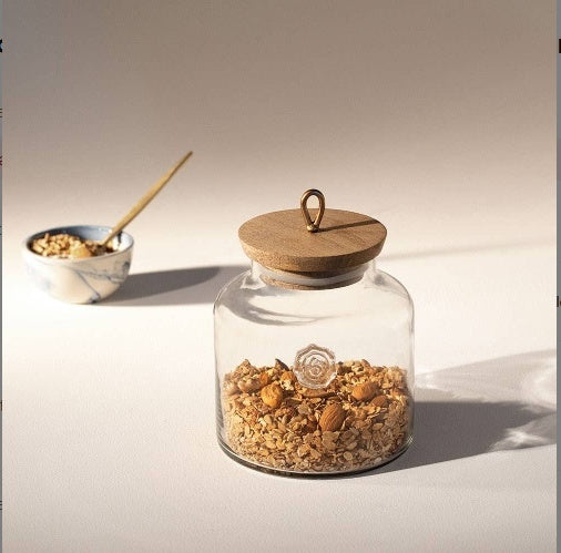 Shopi Vella elegant kitchen storage container with wooden lid holding granola and nuts