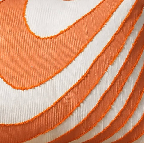 Shopi Vella embroidered throw pillow for living room with orange and white textured design