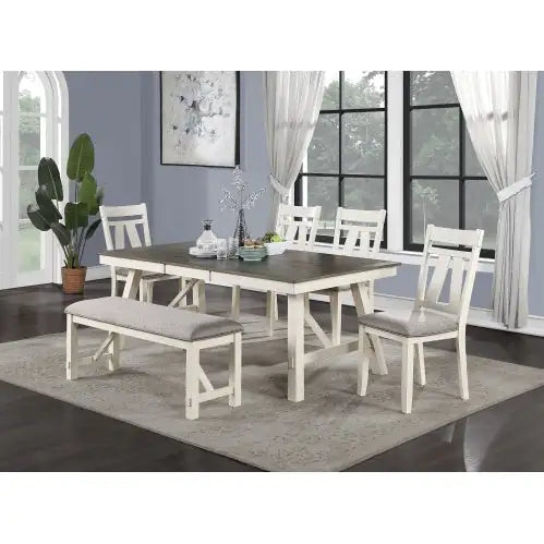 Fabric cushioned dining seating set with white wooden frame includes bench and chairs around a wooden dining table
