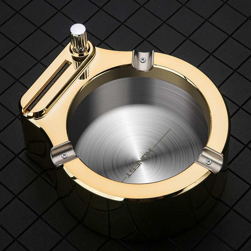 Shopi Vella fancy ashtray for home office with gold and silver finish on black surface