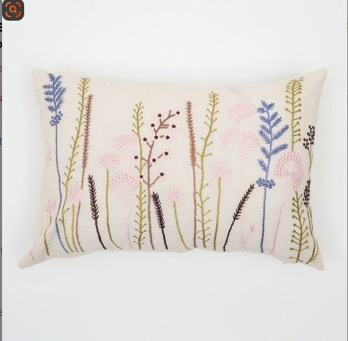 Shopi Vella floral decorative throw pillow case with embroidered stems and flowers on a cream background