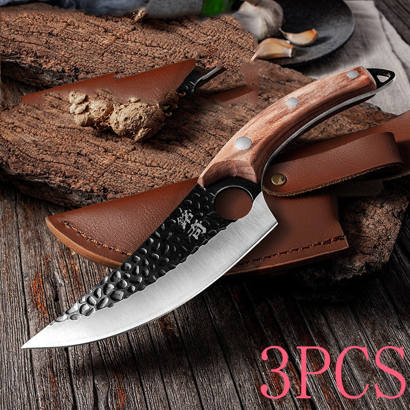 Shopi Vella forged boning knife with hammered blade and wooden handle on leather sheath