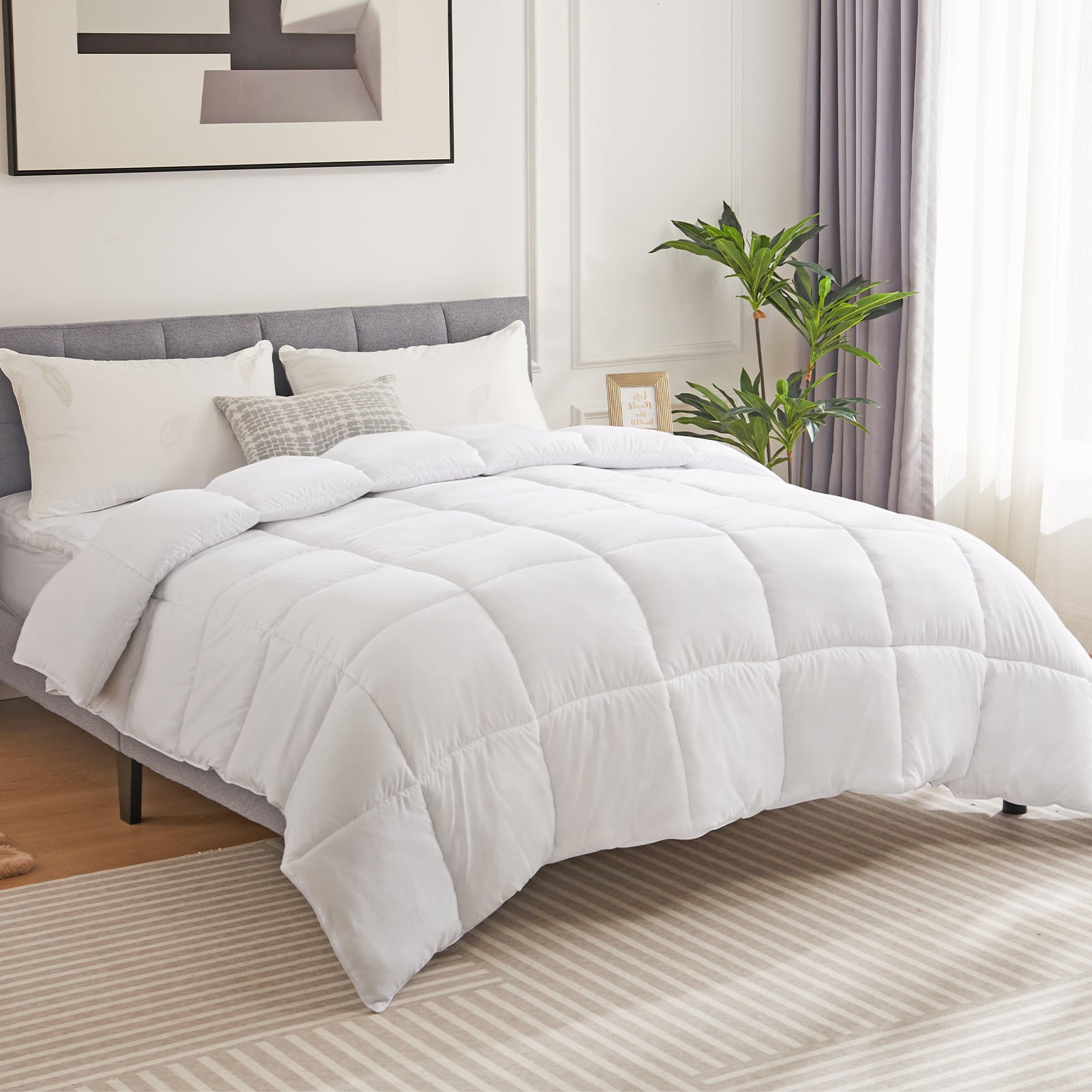 Shopi Vella four season down comforter on bed in modern bedroom with white pillows and gray headboard