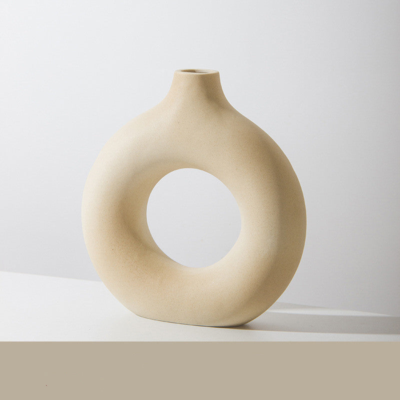 Shopi Vella frosted particle flower arranging vase in beige with circular hollow design for home storage