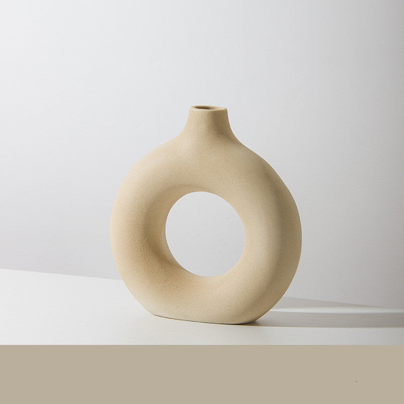 Shopi Vella frosted particle flower arranging vase in beige with a modern round hollow design