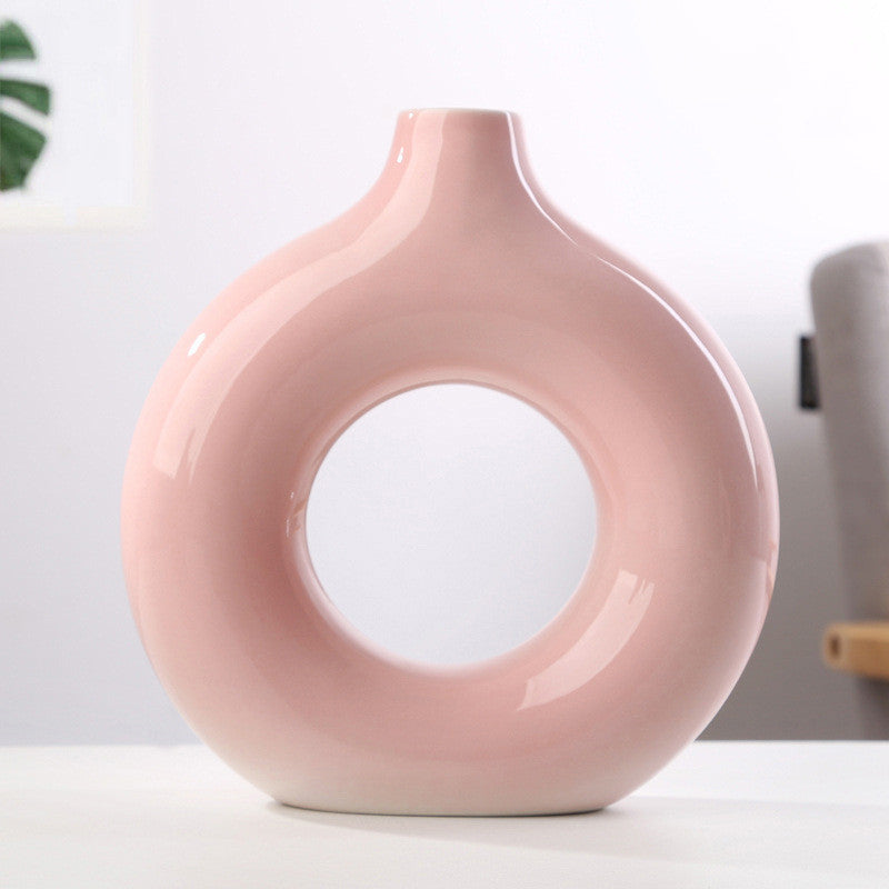 Shopi Vella frosted particle flower arranging vase in soft pink with a circular hollow design