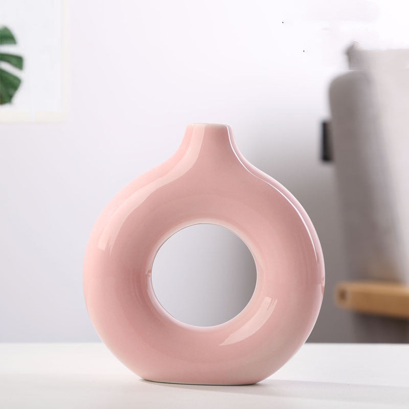 Shopi Vella frosted particle flower arranging vase in pink with circular hollow design for home storage