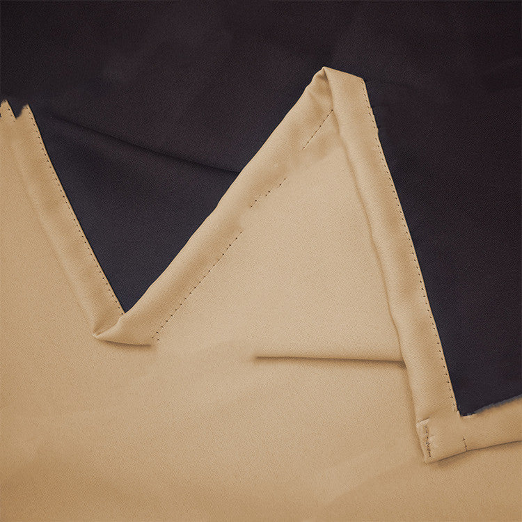 Shopi Vella full blackout curtains with liner showing black front and beige lining fabric close-up