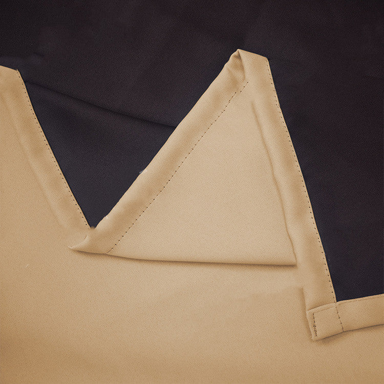 Close-up of beige and black fabric showing full blackout curtains with liner by Shopi Vella