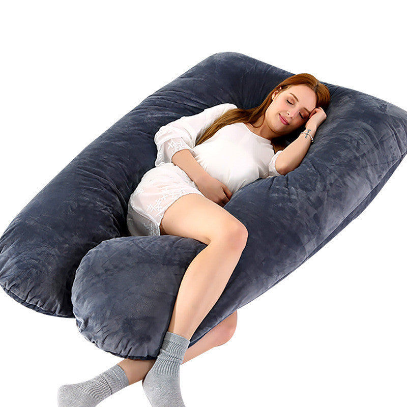 Shopi Vella full body maternity pillow in gray with woman comfortably sleeping and hugging it