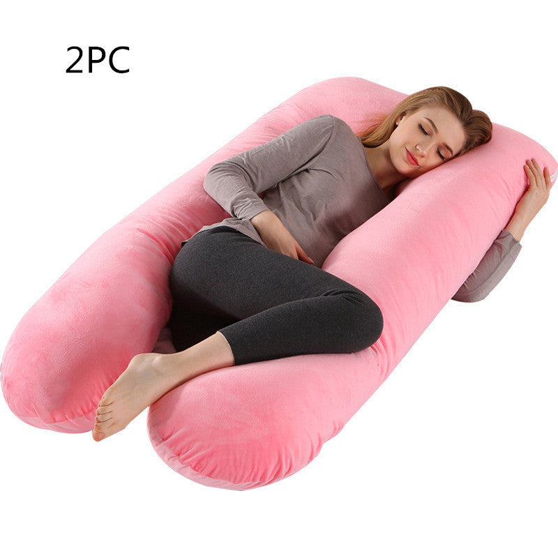Shopi Vella pink pillow case for full body maternity pillow with a woman comfortably resting