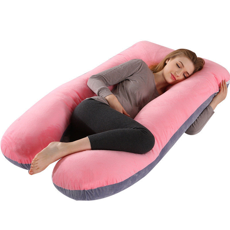 Shopi Vella pink and gray full body maternity pillow with a woman resting comfortably