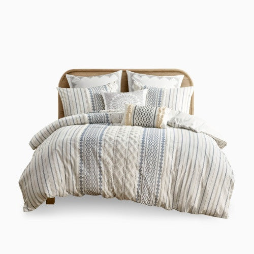 Full queen duvet cover with chenille featuring textured stripes and decorative pillows by Shopi Vella