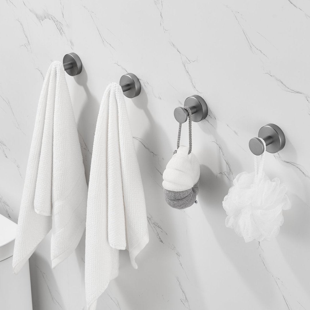 Shopi Vella furniture hardware coat hooks with screws holding towels and bath accessories on marble bathroom wall