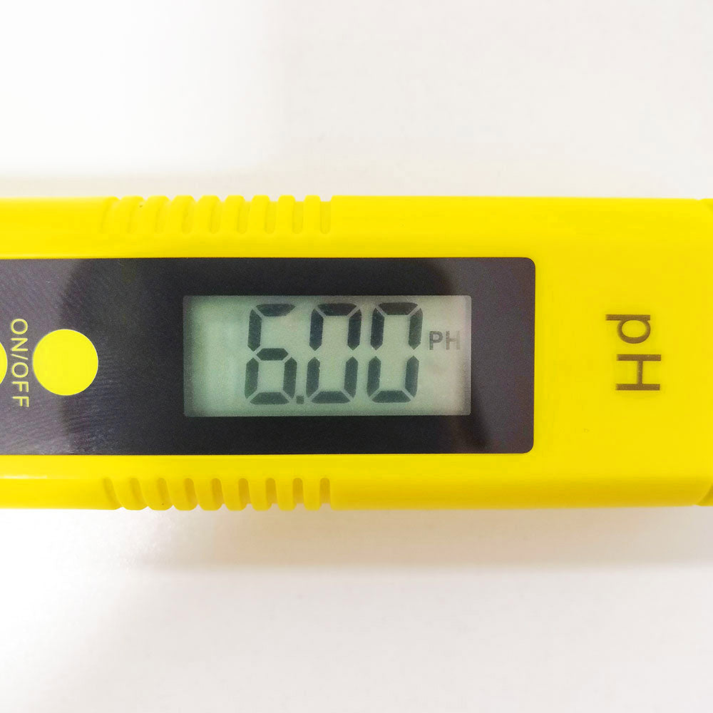 Yellow digital pH meter for aquarium displaying pH reading of 6.00 for accurate water testing