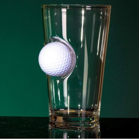 Clear glass golf beer mug with a 3D golf ball design embedded on the side