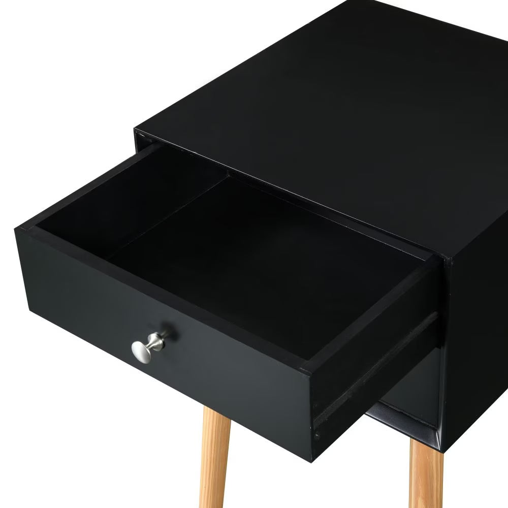 Shopi Vella mid-century modern bedside table with open black drawer and wooden legs