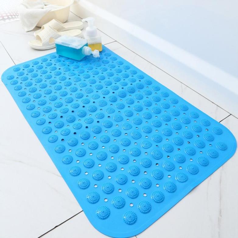Shopi Vella blue non-slip bathroom floor mat with suction cups on tiled bathroom floor