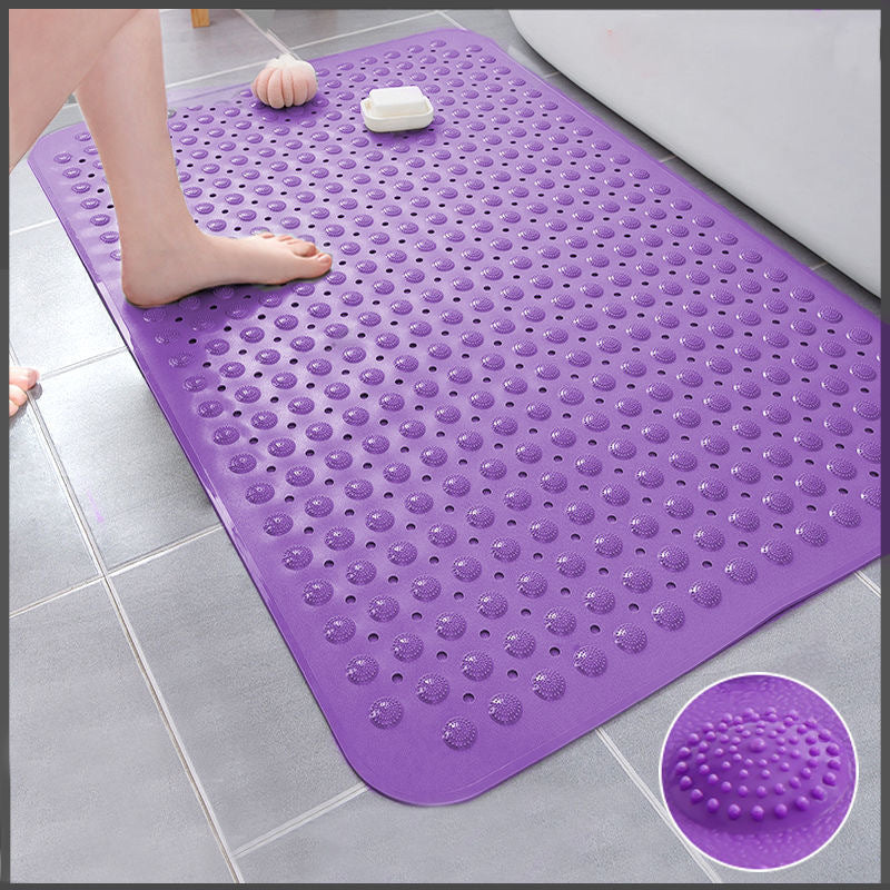 Purple non-slip bathroom floor mat with textured suction cups for safe bathroom use