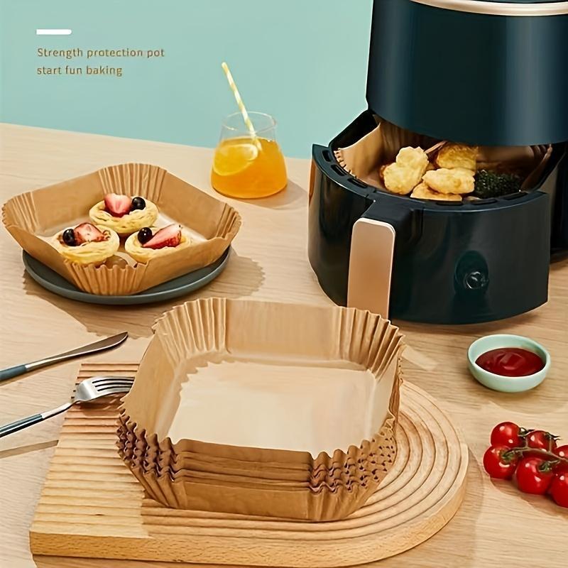 Shopi Vella non-stick air fryer paper 100 pack used in air fryer and for baking pastries on wooden table