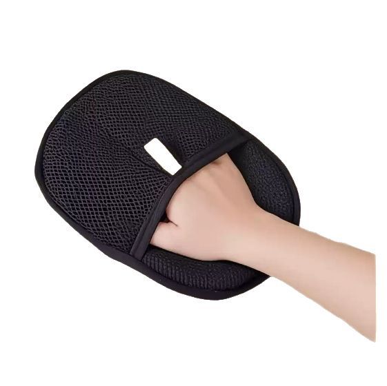 Shopi Vella black pet hair remover glove worn on hand for easy pet hair removal