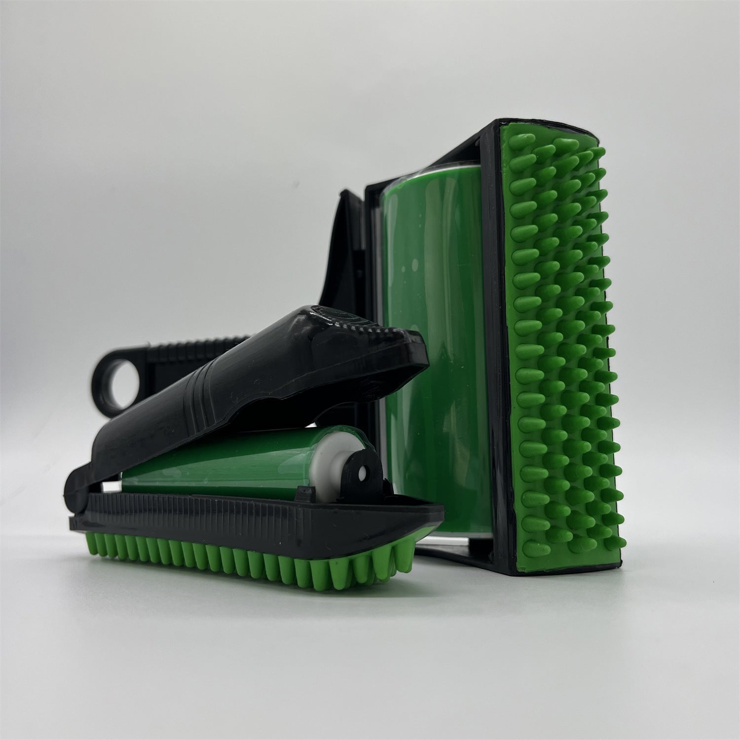 Shopi Vella portable washable hair remover with green bristles and black handle for home storage