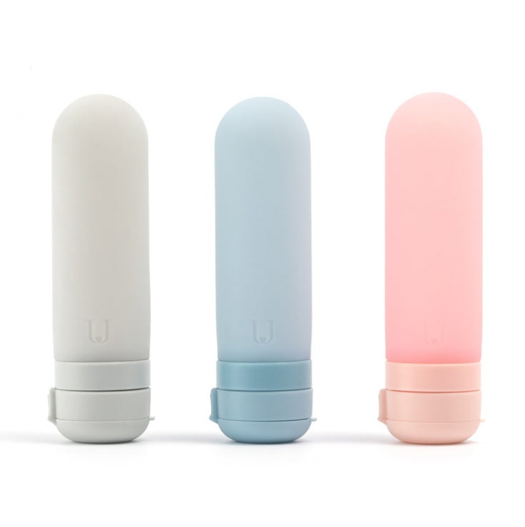 Shopi Vella silicone travel bottles in gray blue and pink for convenient storage and portability