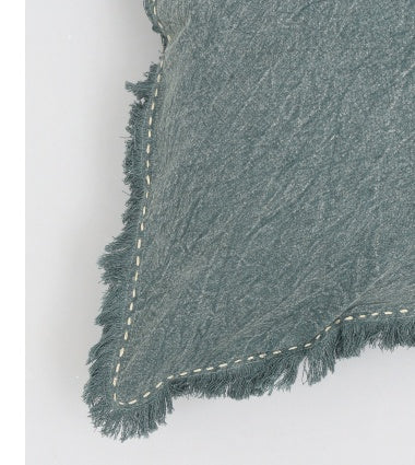 Shopi Vella stonewashed linen throw pillow case with fringed edges and textured fabric in blue