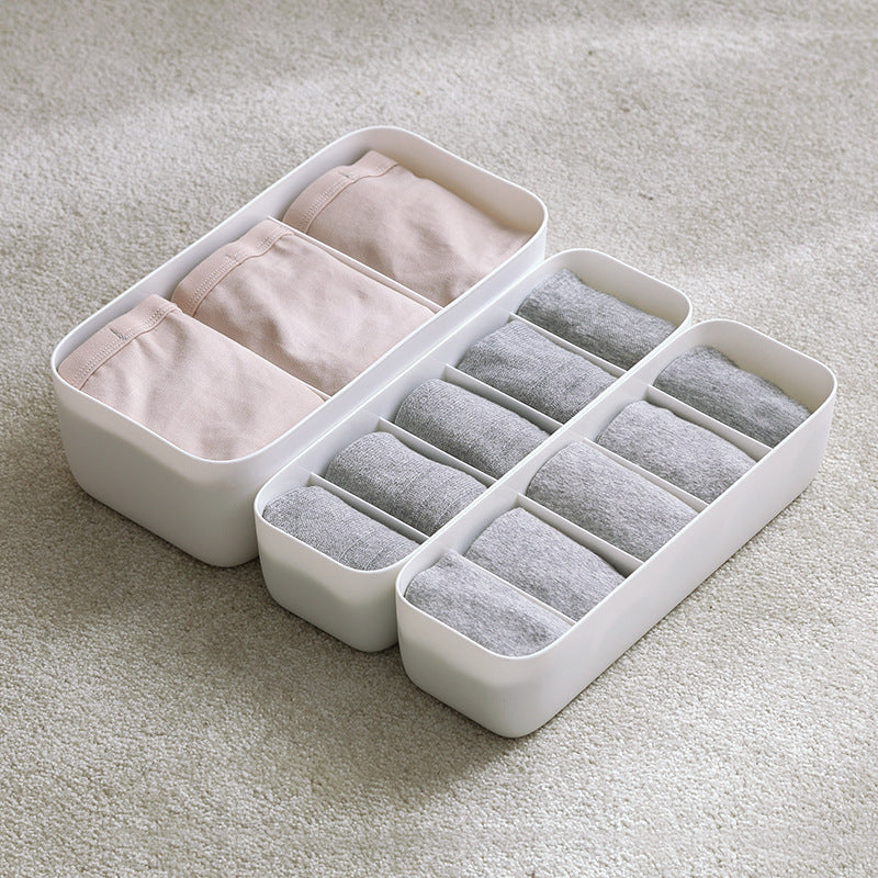 Shopi Vella underwear drawer organizer with white storage bottles and jars neatly holding folded underwear