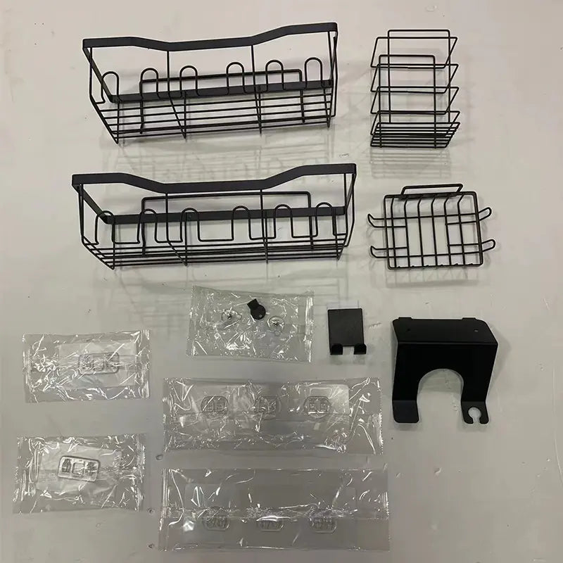 Black wall-mounted shower storage rack set with multiple baskets and mounting accessories