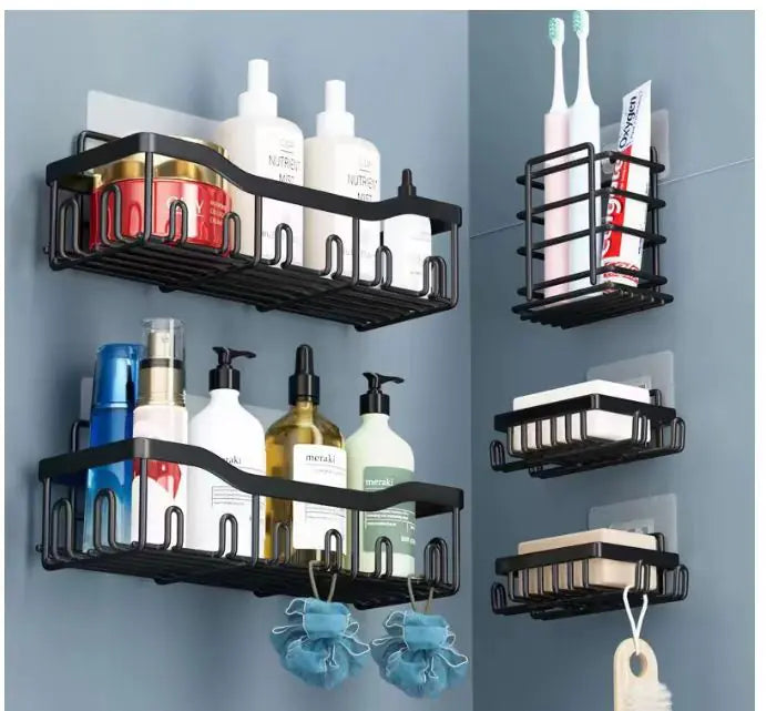 Black metal wall-mounted shower storage rack with multiple shelves holding shampoo, soap, toothbrush, and accessories