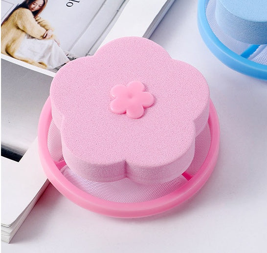Shopi Vella pink washing machine hair catcher shaped like a flower for bathroom storage