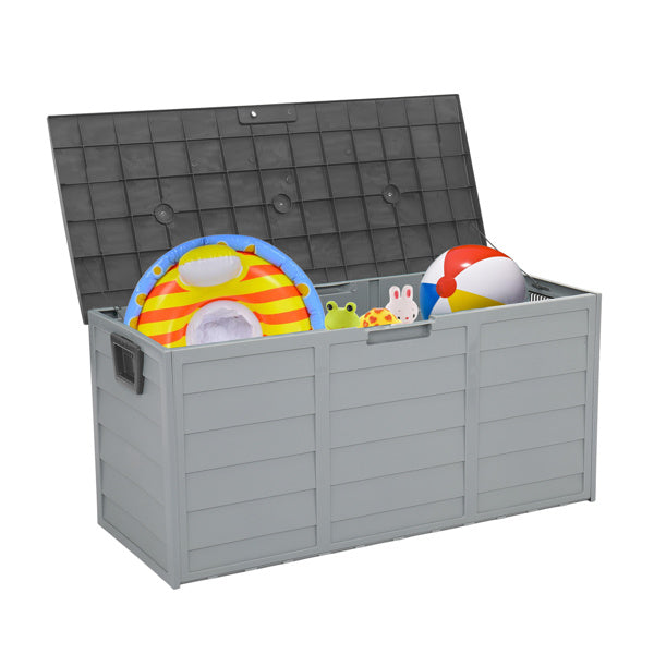 Shopi Vella waterproof patio storage container in gray with black lid holding colorful pool toys and beach ball