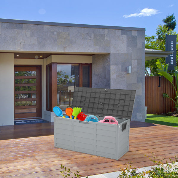 Shopi Vella waterproof patio storage container with toys inside placed on wooden deck outside modern house