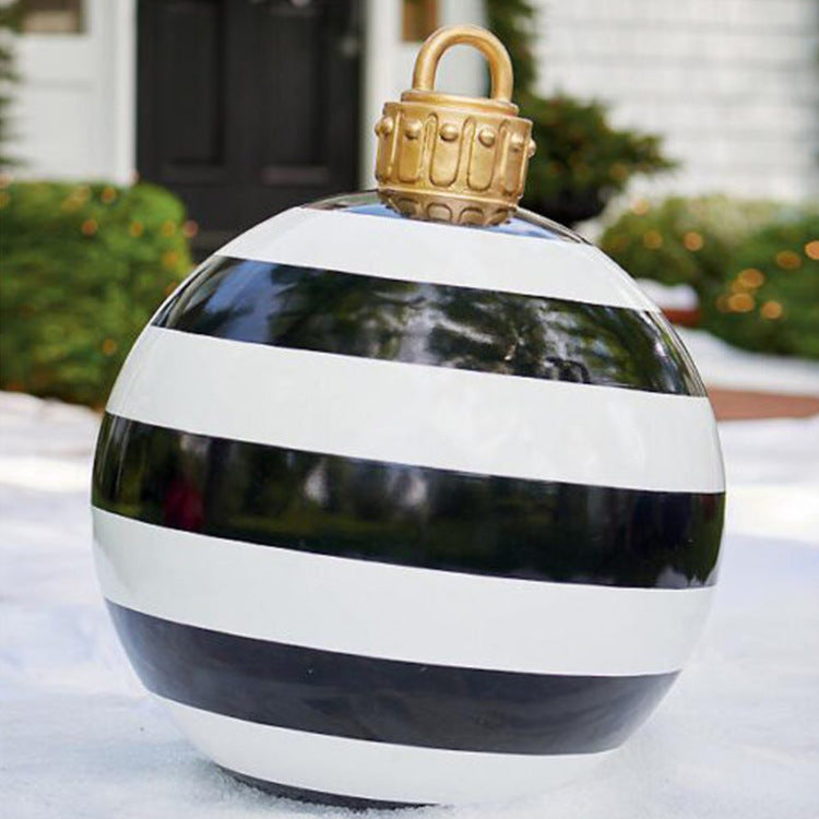 Shopi Vella giant outdoor Christmas ornament ball with black and white stripes and gold top