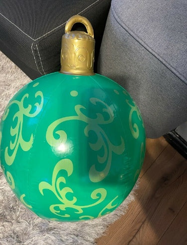 Shopi Vella giant outdoor Christmas ornament ball in green with gold decorative swirls and top cap