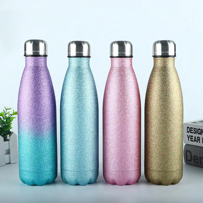 Set of four durable metal sports bottle for hydration in purple, blue, pink, and gold with silver caps