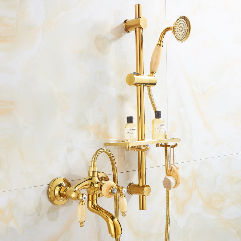 Shopi Vella gold copper bathtub faucet and shower set mounted on marble wall with wooden handle accents