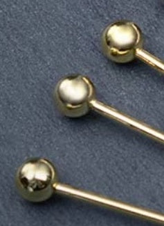 Set of elegant gold fancy cocktail picks for parties by Shopi Vella for stylish drinkware presentation