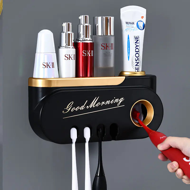 Wall mounted toothbrush holder set in black and gold with slots for toothbrushes and toothpaste storage