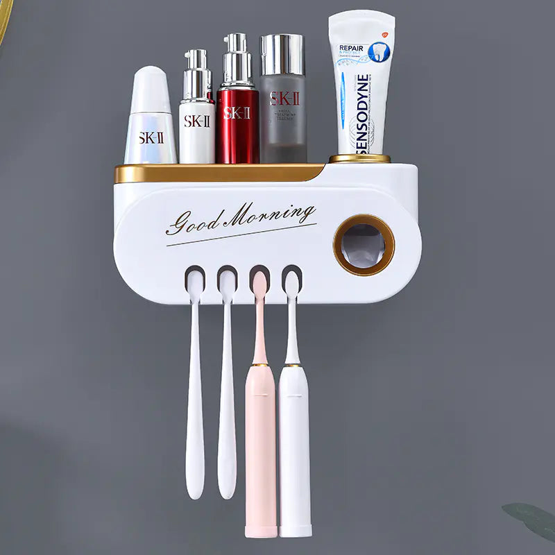 Wall mounted toothbrush holder set with toothpaste and skincare bottles in white and gold design