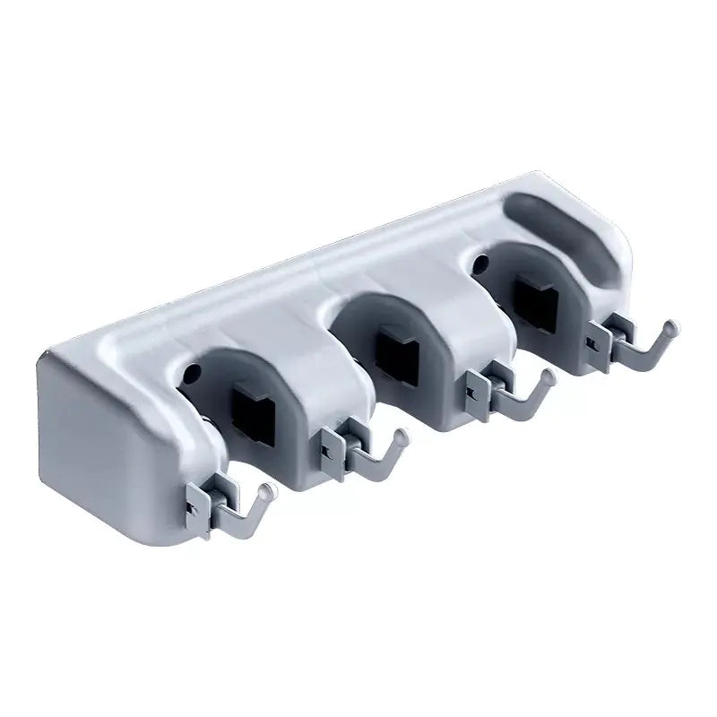 Wall-mounted mop and broom holder with four adjustable grips and hooks for organizing cleaning tools